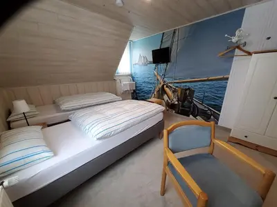 Ein Bett oder Betten in einem Zimmer der Unterkunft B & B Gästehaus Schmidt