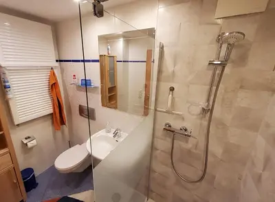 Ein Badezimmer in der Unterkunft B & B Gästehaus Schmidt