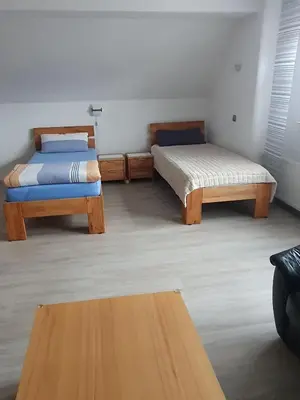 Ein Bett oder Betten in einem Zimmer der Unterkunft Ferienwohnung am Schloss in Königstein
