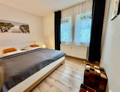 Ein Bett oder Betten in einem Zimmer der Unterkunft M&M Serviced Appartment