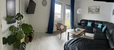 Ein Sitzbereich in der Unterkunft M&M Serviced Appartment
