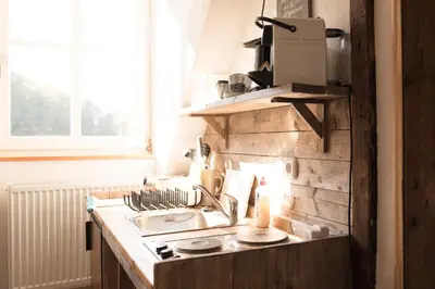 Küche/Küchenzeile in der Unterkunft moments café & apartmenthaus