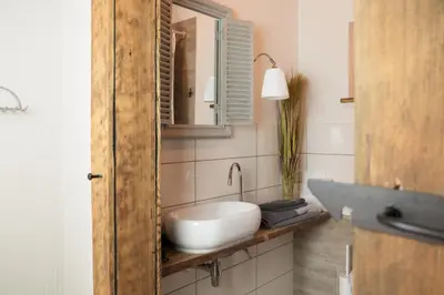 Ein Badezimmer in der Unterkunft moments café & apartmenthaus