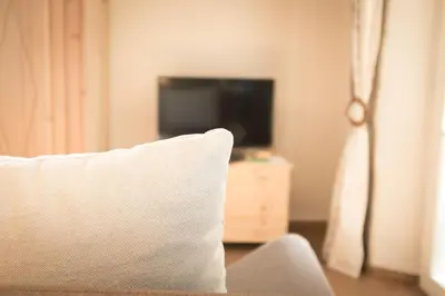 TV/Unterhaltungsangebot in der Unterkunft moments café & apartmenthaus