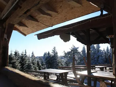 Ein Balkon oder eine Terrasse in der Unterkunft Fichtelberghütte