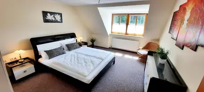 Ein Bett oder Betten in einem Zimmer der Unterkunft Ferienwohnung/ Ferienresidenze Manuela