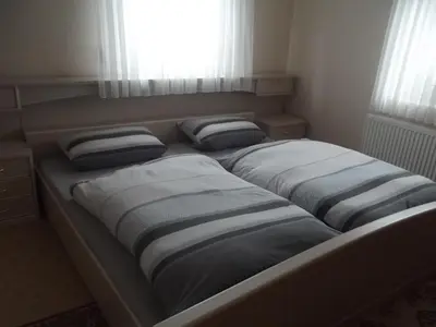 Ein Bett oder Betten in einem Zimmer der Unterkunft Ferienwohnung Seifert