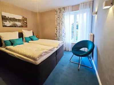 Ein Bett oder Betten in einem Zimmer der Unterkunft Apartment Apart Waldershof