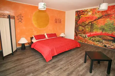 Ein Bett oder Betten in einem Zimmer der Unterkunft Kunsthof Eibenstock