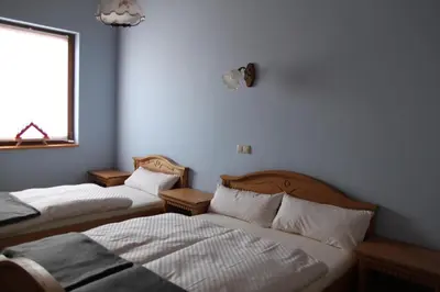 Ein Bett oder Betten in einem Zimmer der Unterkunft Kunsthof Eibenstock