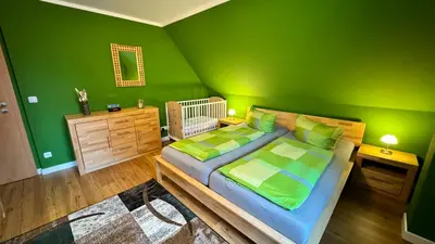 Ein Bett oder Betten in einem Zimmer der Unterkunft Ferienwohnung-direkt-am-Skihang mit Sauna