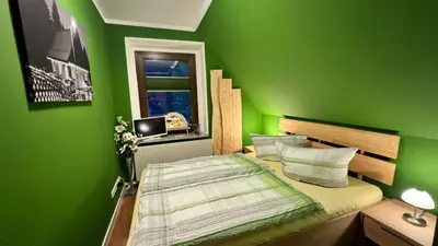 Ein Bett oder Betten in einem Zimmer der Unterkunft Ferienwohnung-direkt-am-Skihang mit Sauna