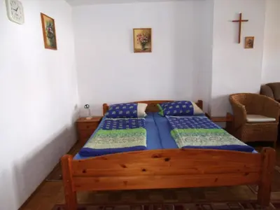 Ein Bett oder Betten in einem Zimmer der Unterkunft Ferienwohnungen Peterbartl-Hof