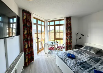 Ein Bett oder Betten in einem Zimmer der Unterkunft Ferienwohnung 