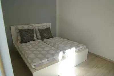 Ein Bett oder Betten in einem Zimmer der Unterkunft Ferienwohnung Häckel