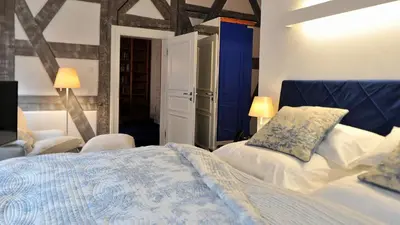 Ein Bett oder Betten in einem Zimmer der Unterkunft Schlosshotel Betzenstein