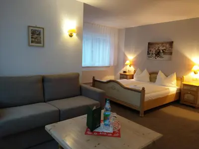 Ein Bett oder Betten in einem Zimmer der Unterkunft Gasthaus-Pension Herberger