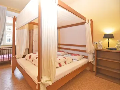 Ein Bett oder Betten in einem Zimmer der Unterkunft Gruppenhaus mit German Heimkino, 18 Personen