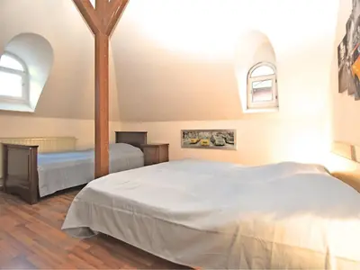 Ein Bett oder Betten in einem Zimmer der Unterkunft Gruppenhaus mit German Heimkino, 18 Personen