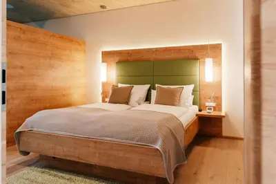 Ein Bett oder Betten in einem Zimmer der Unterkunft Der Heindlhof
