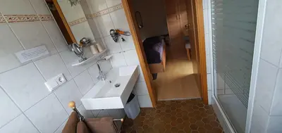 Ein Badezimmer in der Unterkunft Hotel / Pension Wolf
