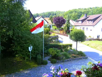 Ein Garten an der Unterkunft Hotel / Pension Wolf