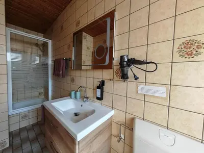 Ein Badezimmer in der Unterkunft Hotel / Pension Wolf