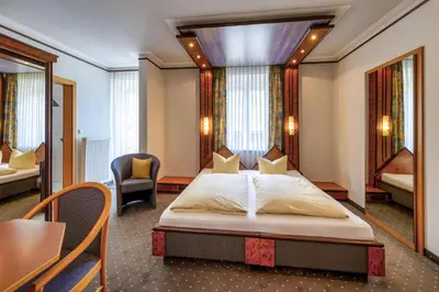 Ein Bett oder Betten in einem Zimmer der Unterkunft Bruckmayers Gästehaus