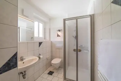 Ein Badezimmer in der Unterkunft Bruckmayers Gästehaus