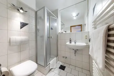 Ein Badezimmer in der Unterkunft Bruckmayers Gästehaus