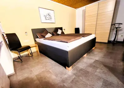 Ein Bett oder Betten in einem Zimmer der Unterkunft Ferienwohnung Seidl