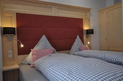 Ein Bett oder Betten in einem Zimmer der Unterkunft Wohlfühl-Ferienwohnungen König