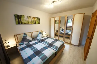 Ein Bett oder Betten in einem Zimmer der Unterkunft Idyll im Grünen