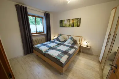 Ein Bett oder Betten in einem Zimmer der Unterkunft Idyll im Grünen