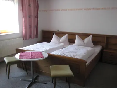 Ein Bett oder Betten in einem Zimmer der Unterkunft Ferienwohnungen Haberberger