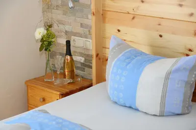 Ein Bett oder Betten in einem Zimmer der Unterkunft Limerhof