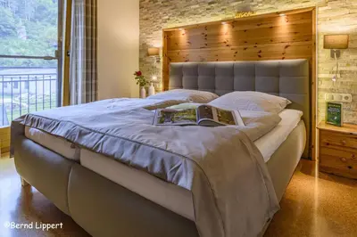 Ein Bett oder Betten in einem Zimmer der Unterkunft Limerhof