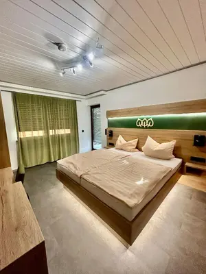 Ein Bett oder Betten in einem Zimmer der Unterkunft Gasthof - Pension - Drei Linden