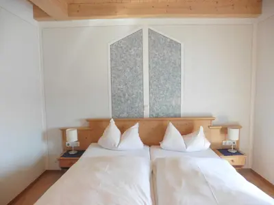 Ein Bett oder Betten in einem Zimmer der Unterkunft Gasthof - Pension - Drei Linden