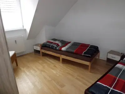 Ein Bett oder Betten in einem Zimmer der Unterkunft Fewo Floss