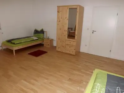 Ein Bett oder Betten in einem Zimmer der Unterkunft Fewo Floss