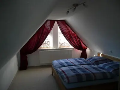 Ein Bett oder Betten in einem Zimmer der Unterkunft Maisonette 64m 2 Schlafzimmer in Oberwiesenthal