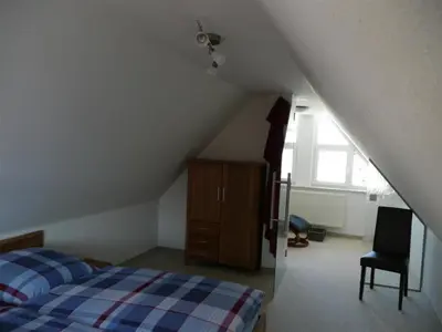 Ein Bett oder Betten in einem Zimmer der Unterkunft Maisonette 64m 2 Schlafzimmer in Oberwiesenthal
