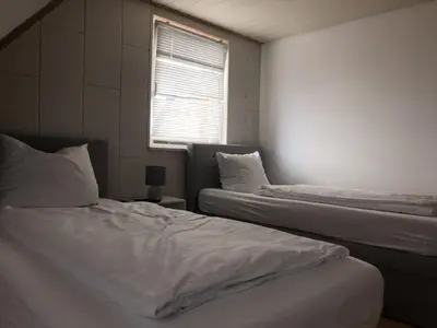 Ein Bett oder Betten in einem Zimmer der Unterkunft SAD100 - Gemütliche Monteurwohnungen in Schwandorf