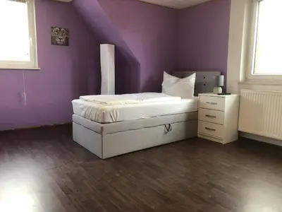 Ein Bett oder Betten in einem Zimmer der Unterkunft SAD100 - Gemütliche Monteurwohnungen in Schwandorf