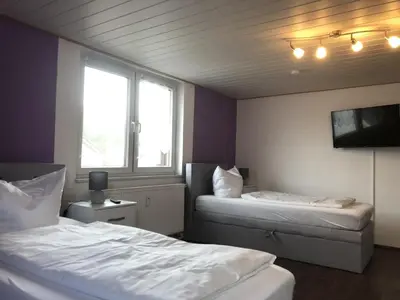 Ein Bett oder Betten in einem Zimmer der Unterkunft SAD100 - Gemütliche Monteurwohnungen in Schwandorf