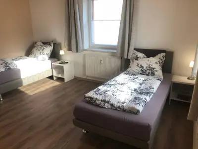 Ein Bett oder Betten in einem Zimmer der Unterkunft SAD100 - Gemütliche Monteurwohnungen in Schwandorf