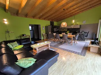 Ein Sitzbereich in der Unterkunft Ferienhaus Brütting