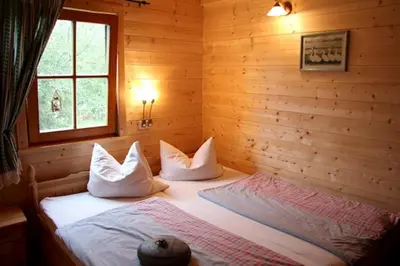 Ein Bett oder Betten in einem Zimmer der Unterkunft Biehlerhof