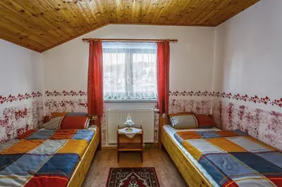 Ein Bett oder Betten in einem Zimmer der Unterkunft Ferienhaus Gläser